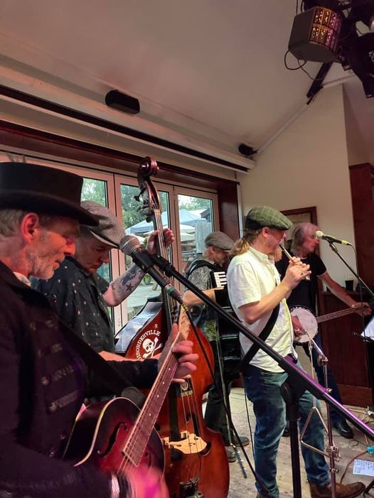 This image has an empty alt attribute; its file name is folk-round-the-tree-21.jpg